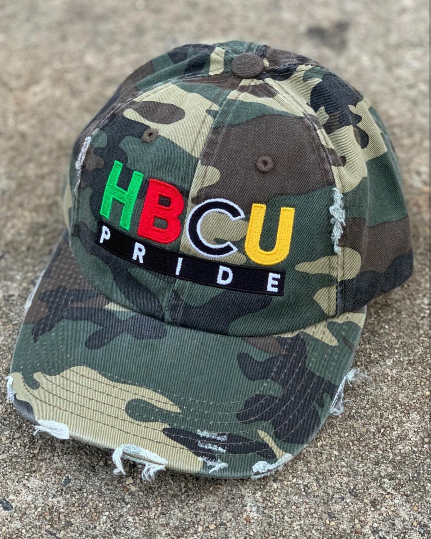 The "Disguise" HBCU Pride Banner Distressed Hat in Camo